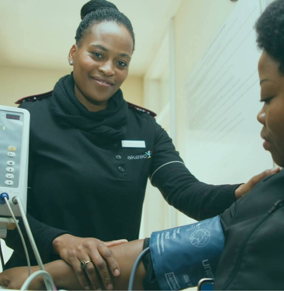 Checking Blood pressure at Hometown Health Clinic