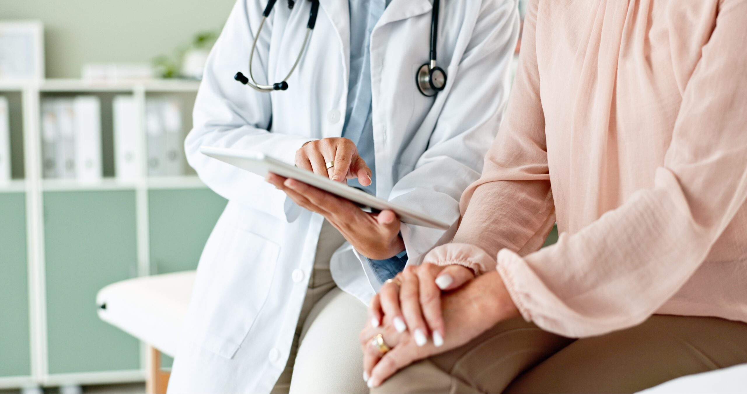 Clinic,,Tablet,And,Hands,Of,Doctor,With,Patient,For,Consulting,